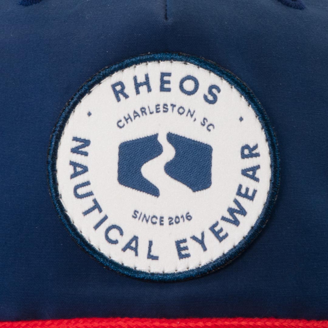 Rheos Patch Navy Snapback Hat