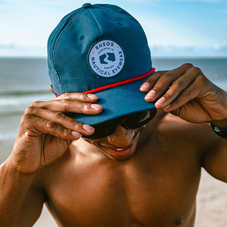 Rheos Patch Navy Snapback Hat